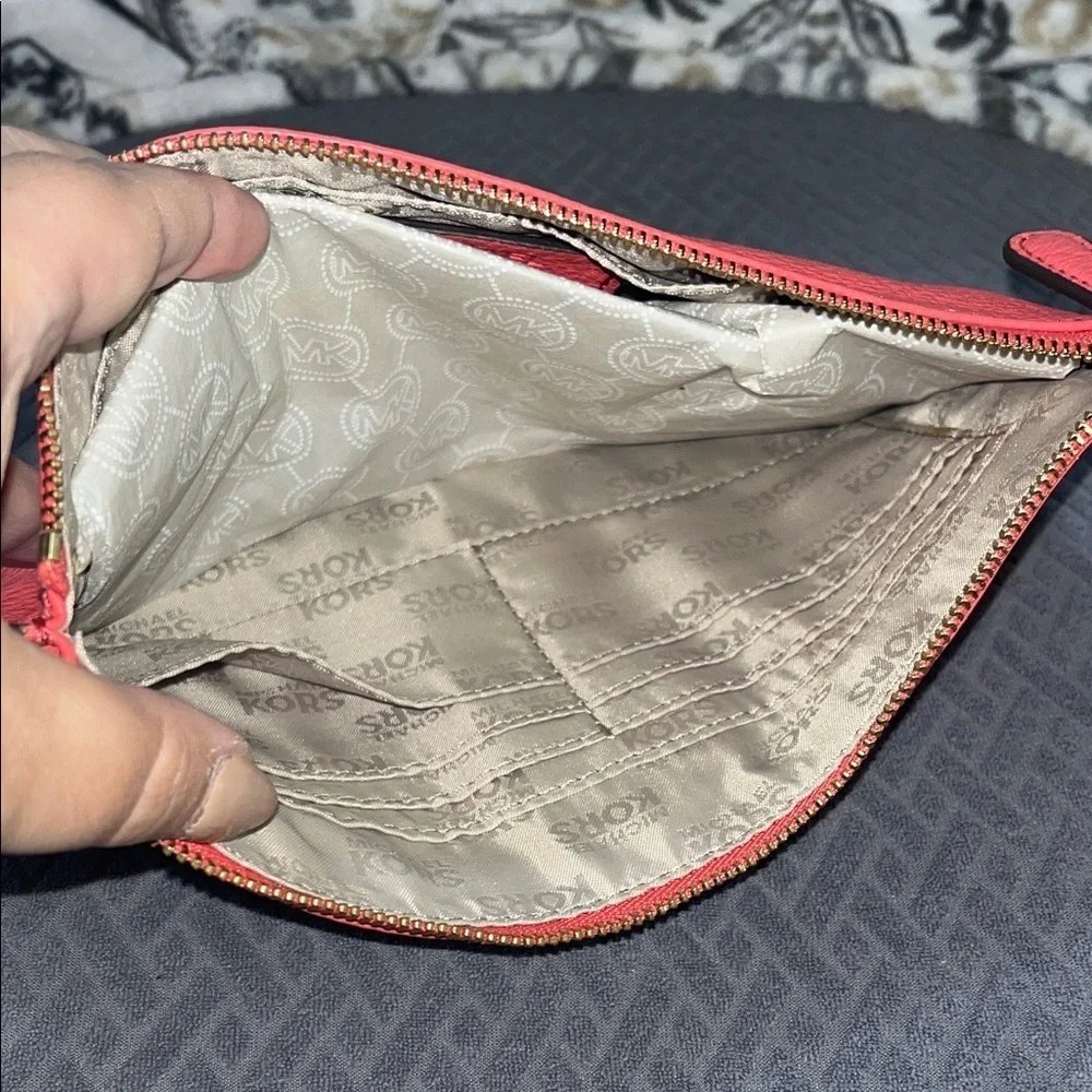 Michael Kors Coral Wristlet with Gold Logo
